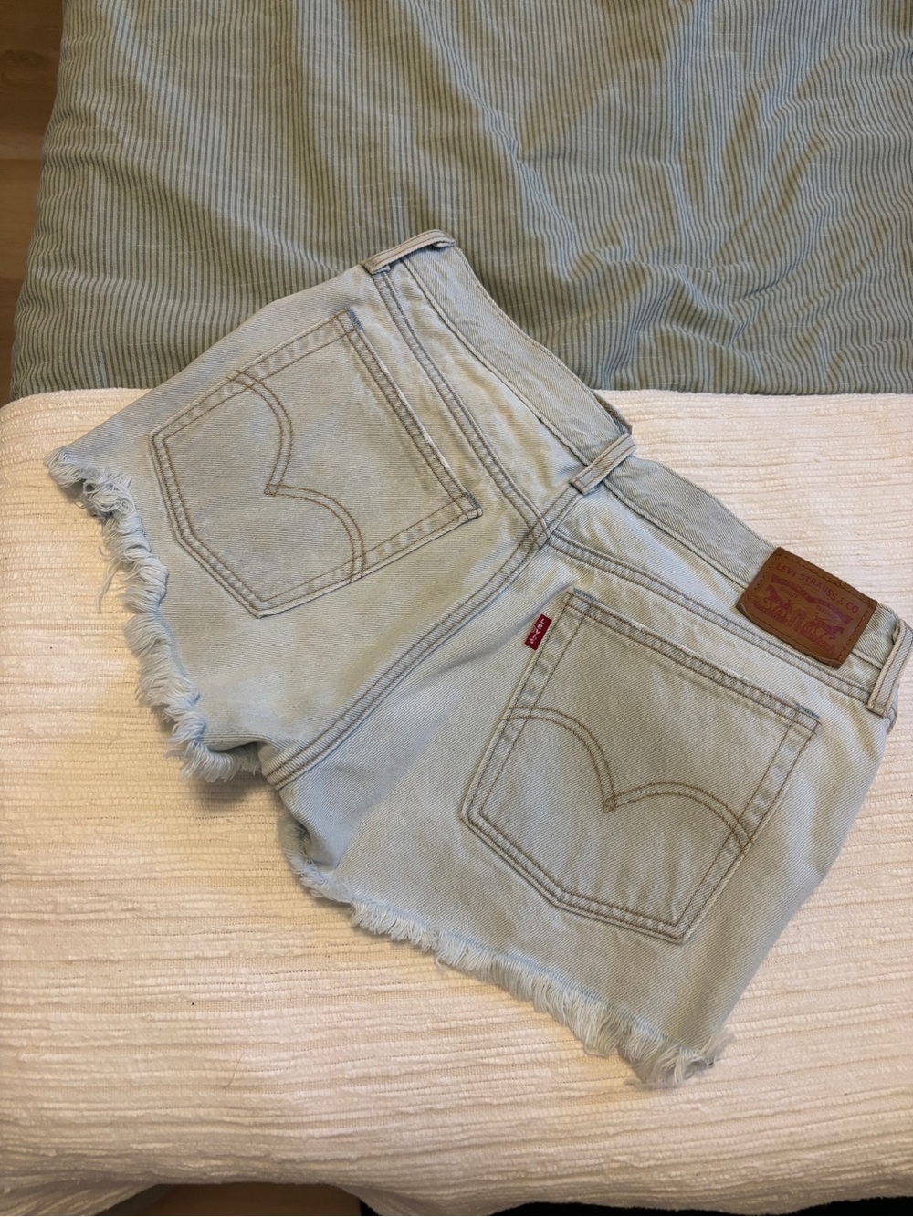 Levi's Light Blue Frayed Hem Denim Shorts - Women's